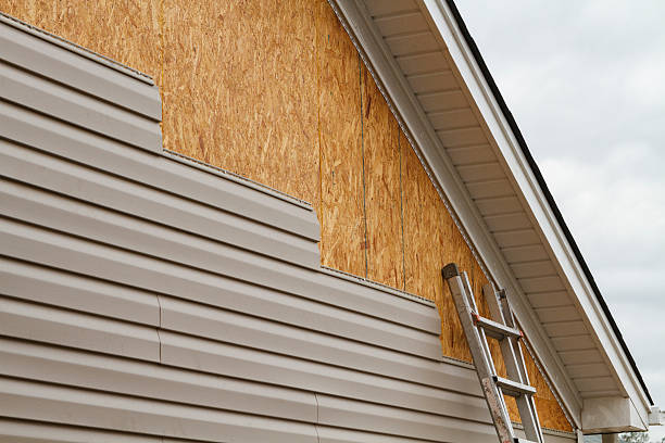 Professional Siding Installation technician working in Zebulon, NC